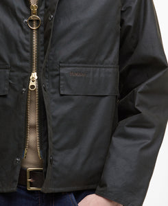 Model wearing Barbour Spey Wax Jacket in Olive. 