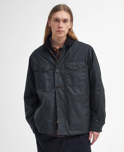 Model wearing Barbour Wax Deck Jacket in Sage.