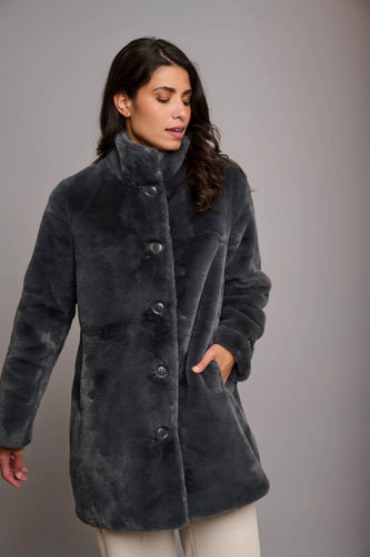 Model wearing Rino & Pelle - Nonna Jacket in Night.