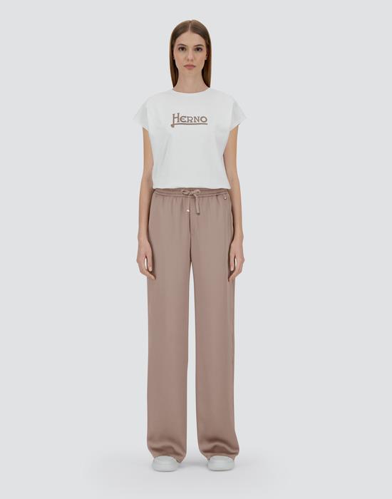 Model wearing Herno - Women's Trousers in Taupe.