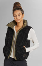 Load image into Gallery viewer, Model wearing Alp N Rock - Sonja Reversible Short Vest in Dark Moss.
