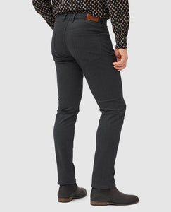 Model wearing Rodd & Gunn - Motion Melange Straight Fit Jean in Onyx - back.