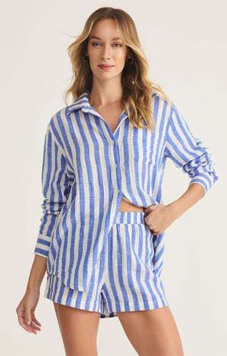 Model wearing ZSupply - Saturdays Stripe Shirt in white/blue stripe.