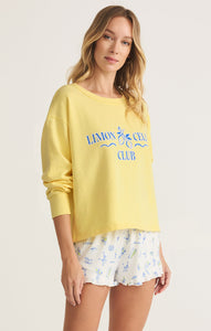 Model wearing ZSupply - Limoncello Sweatshirt in Lemonade.