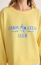 Load image into Gallery viewer, Model wearing ZSupply - Limoncello Sweatshirt in Lemonade.
