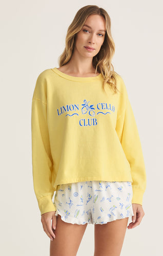 Model wearing ZSupply - Limoncello Sweatshirt in Lemonade.