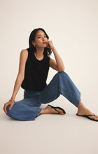 Load image into Gallery viewer, Model wearing ZSupply - Sloane Jersey Muscle Tank in Black.
