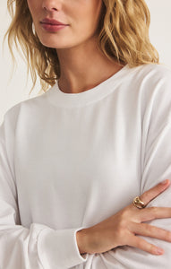Model wearing ZSupply - Ellis Sweatshirt in White.
