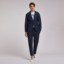 Load image into Gallery viewer, Model wearing TMB - Performance Travel Sportcoat G1J1 in Navy.
