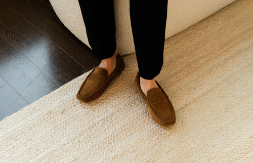 Model wearing Oliver Cabell Men's Driving Loafers in Chestnut.