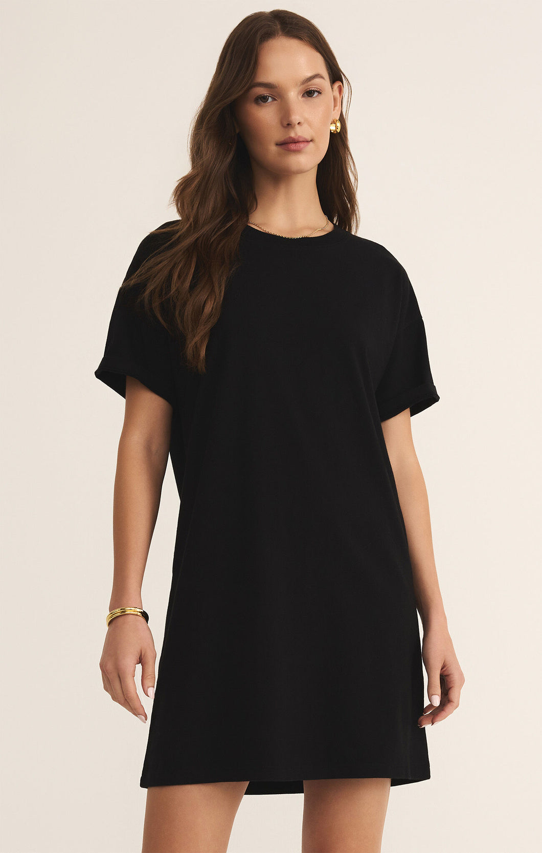 Model wearing ZSupply Sway Mini Dress in True Black.