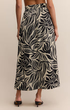 Load image into Gallery viewer, Model wearing ZSupply Serendipity Isla Leaf Skirt in Black - back.
