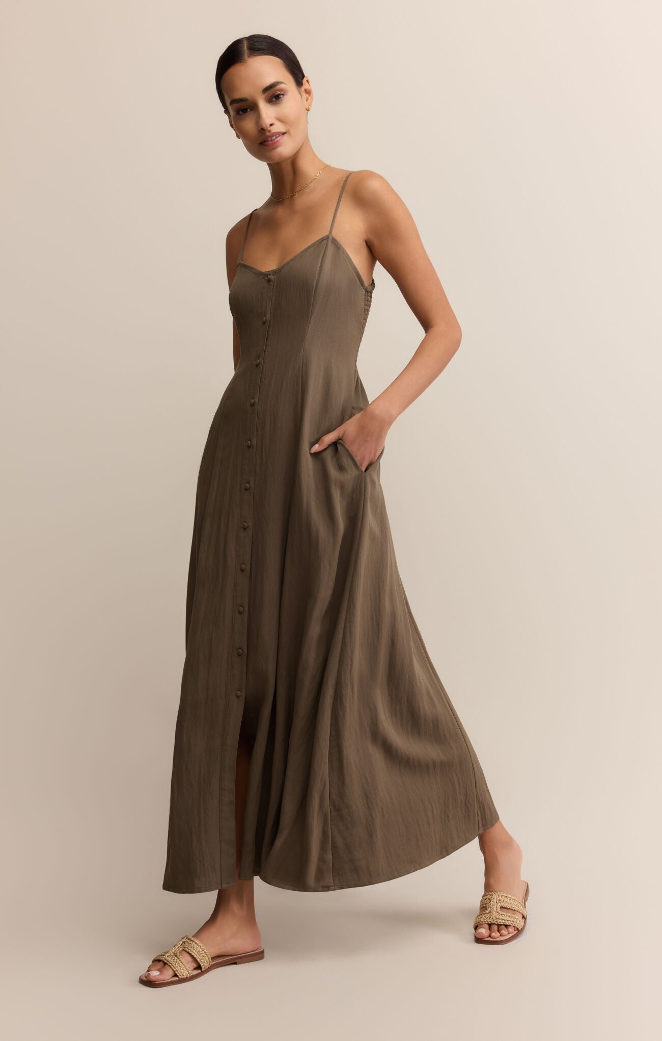 Model wearing ZSupply Angel Eyes Midi Dress in Tiki.