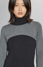 Load image into Gallery viewer, Model wearing Alp N Rock - Marta Mock Neck Shirt in Black.

