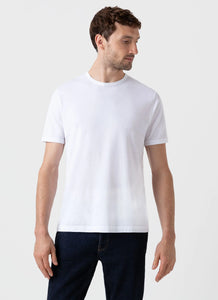 Model wearing Sunspel - Classic Crew Neck T-shirt in white.