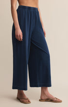 Load image into Gallery viewer, Model wearing ZSupply - Scout Jersey Pant in Indigo
