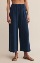 Load image into Gallery viewer, Model wearing ZSupply - Scout Jersey Pant in Indigo.
