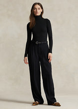 Load image into Gallery viewer, Model wearing Polo Ralph Lauren - Stretch Ribbed Turtleneck in Black.
