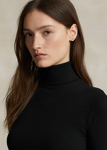 Model wearing Polo Ralph Lauren - Stretch Ribbed Turtleneck in Black.