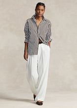 Load image into Gallery viewer, Model wearing Polo Ralph Lauren - Relaxed Fit Striped Cotton Shirt in Brown/White Stripe.
