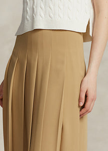 Model wearing Polo Ralph Lauren - Satin Pleated A-Line Midi Skirt in Camel.