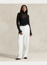 Load image into Gallery viewer, Model wearing Polo Ralph Lauren - Ruffle-Trim Pointelle-Knit Top in Black.
