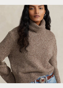 Model wearing Polo Ralph Lauren - Wool-Cashmere Turtleneck Sweater in Brown Marle.