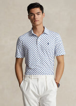 Load image into Gallery viewer, Model wearing POLO Ralph Lauren - Classic Fit Performance Polo Shirt in Preppy Woodblock.
