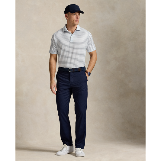 Model wearing RLX - Ralph Lauren Classic Fit Performance Polo Shirt in Office Blue Multi.