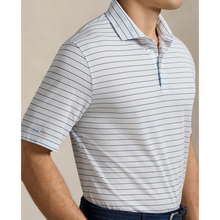 Load image into Gallery viewer, Model wearing RLX - Ralph Lauren Classic Fit Performance Polo Shirt in Office Blue Multi.
