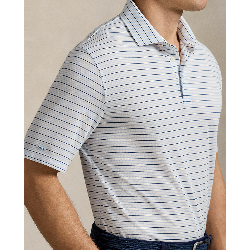 Model wearing RLX - Ralph Lauren Classic Fit Performance Polo Shirt in Office Blue Multi.