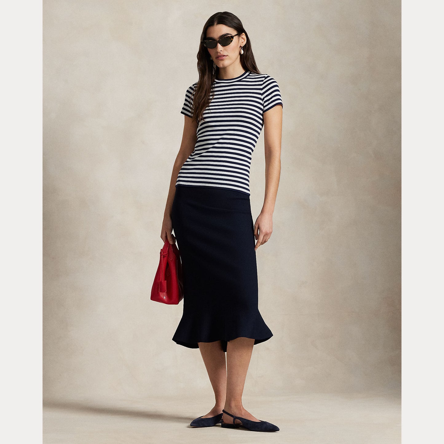 Model wearing Polo Ralph Lauren - Flared Knit Skirt in Hunter Navy.