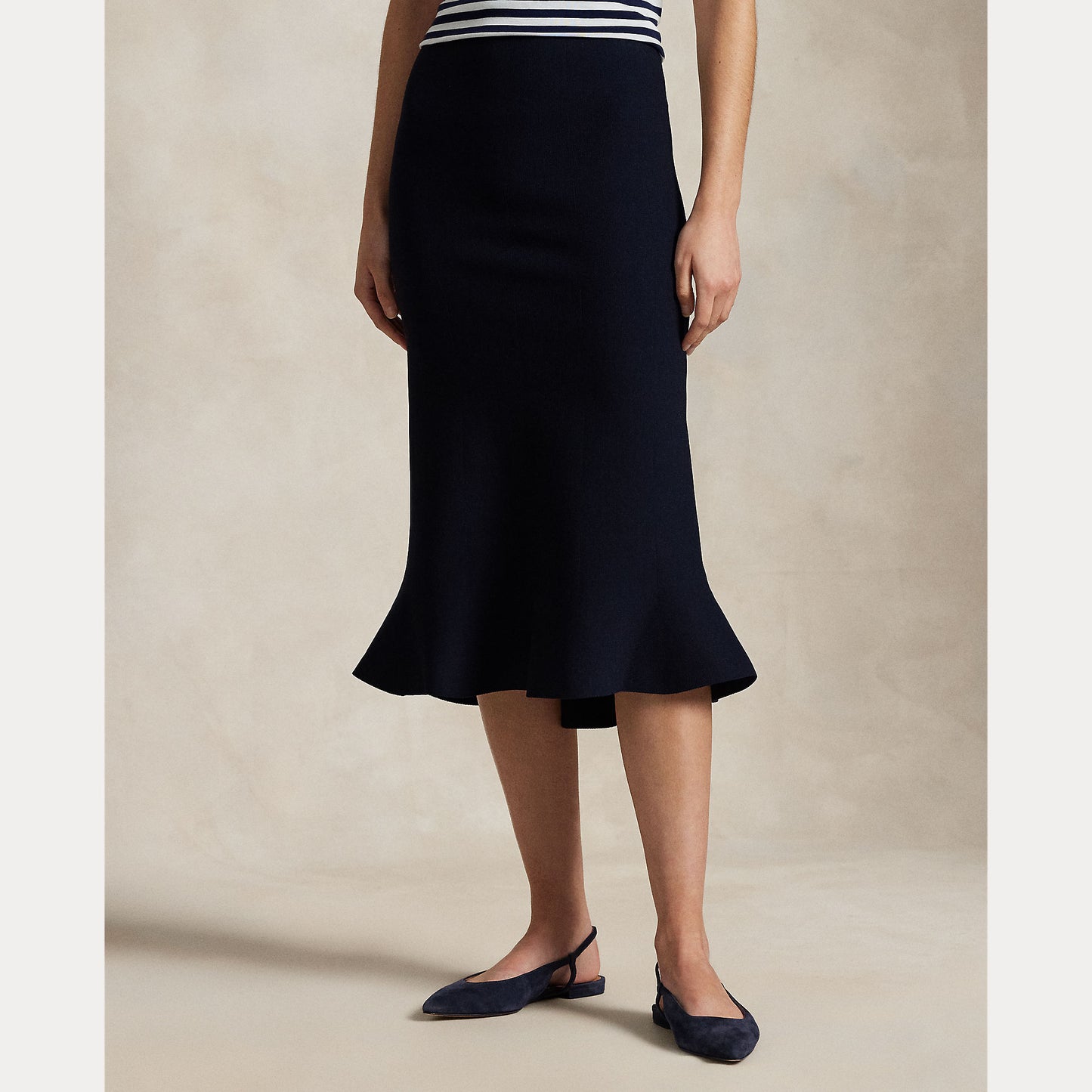 Model wearing Polo Ralph Lauren - Flared Knit Skirt in Hunter Navy.