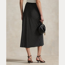 Load image into Gallery viewer, Model wearing Polo Ralph Lauren - Poly Satin Polka Dot Maxi Pencil Skirt in Polka Dot Black/White - back.
