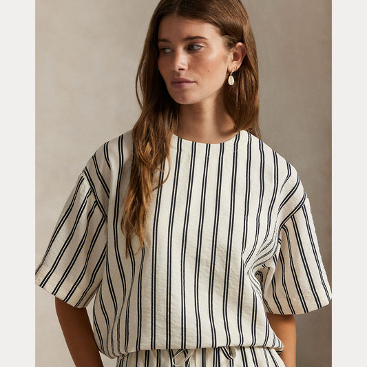 Model wearing Polo Ralph Lauren - Silk Nylon SS Crew Neck Blouse in White/Black Stripe.