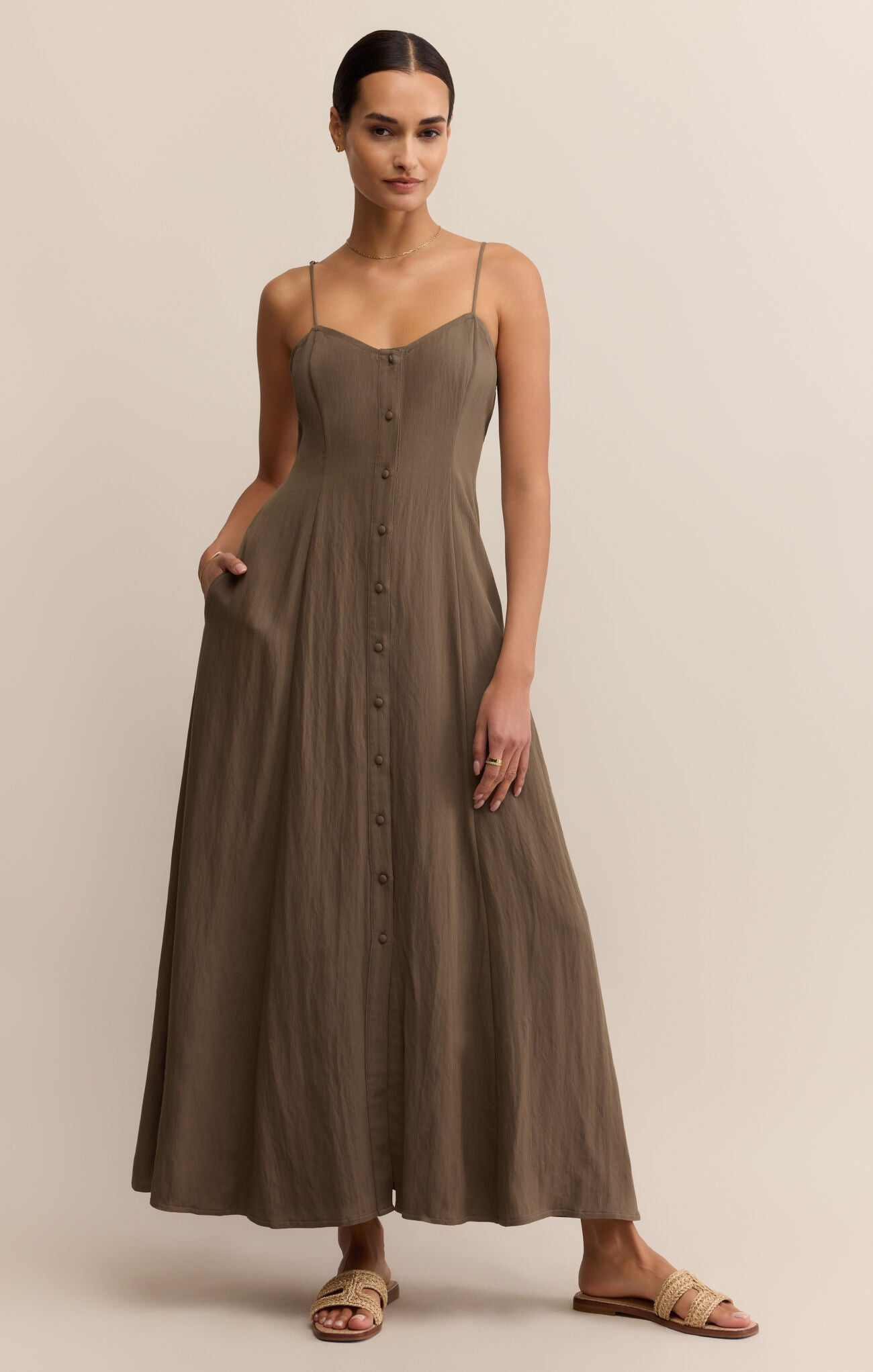 Model wearing ZSupply Angel Eyes Midi Dress in Tiki.