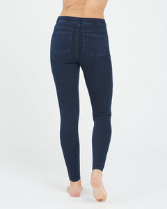 Model wearing Spanx - Jean-ish Ankle Leggings in twilight rinse back.