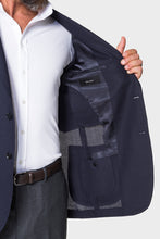 Load image into Gallery viewer, Model wearing Ring Jacket Signature Navy Balloon Jacket.
