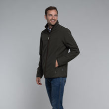 Load image into Gallery viewer, Model wearing Schoffel Men&#39;s Burrough Jacket in Forest.
