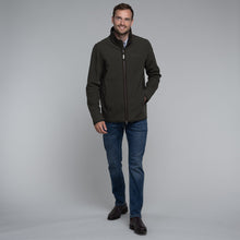 Load image into Gallery viewer, Model wearing Schoffel Men&#39;s Burrough Jacket in Forest.
