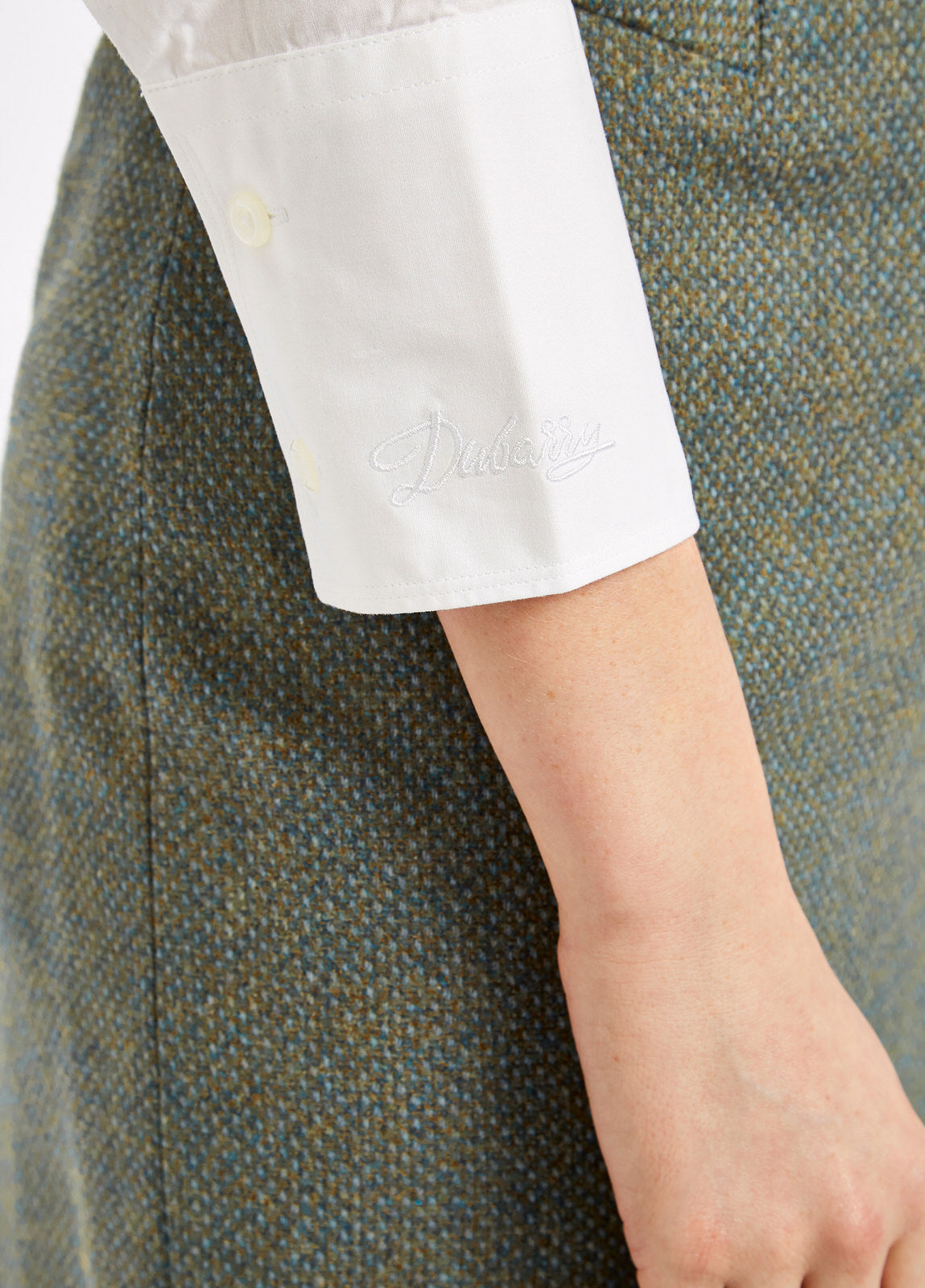 Model wearing Dubarry Snowdrop long sleeve button down shirt in white.