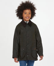 Load image into Gallery viewer, Model wearing Barbour Youth Beaufort Jacket in Olive.
