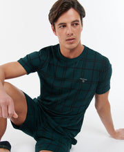 Load image into Gallery viewer, Model wearing Barbour Sid Tartan Lounge Set in Dark Green.
