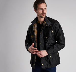 Model wearing Barbour International Original Jacket in black.