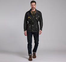 Load image into Gallery viewer, Model wearing Barbour International Original Jacket in black.
