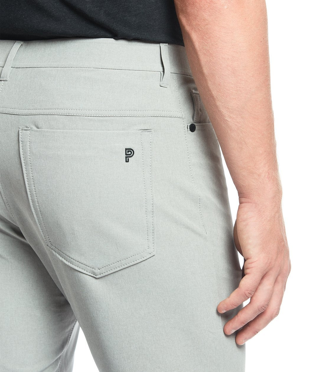 Model wearing Public Rec Workday Pant straight leg in fog.