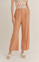 Load image into Gallery viewer, Model wearing Sadie &amp; Sage - Out West Linen Pants in Tan.
