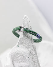 Load image into Gallery viewer, Pig &amp; Hen Vicious Vik Bracelet in green and light gray with silver buckle.

