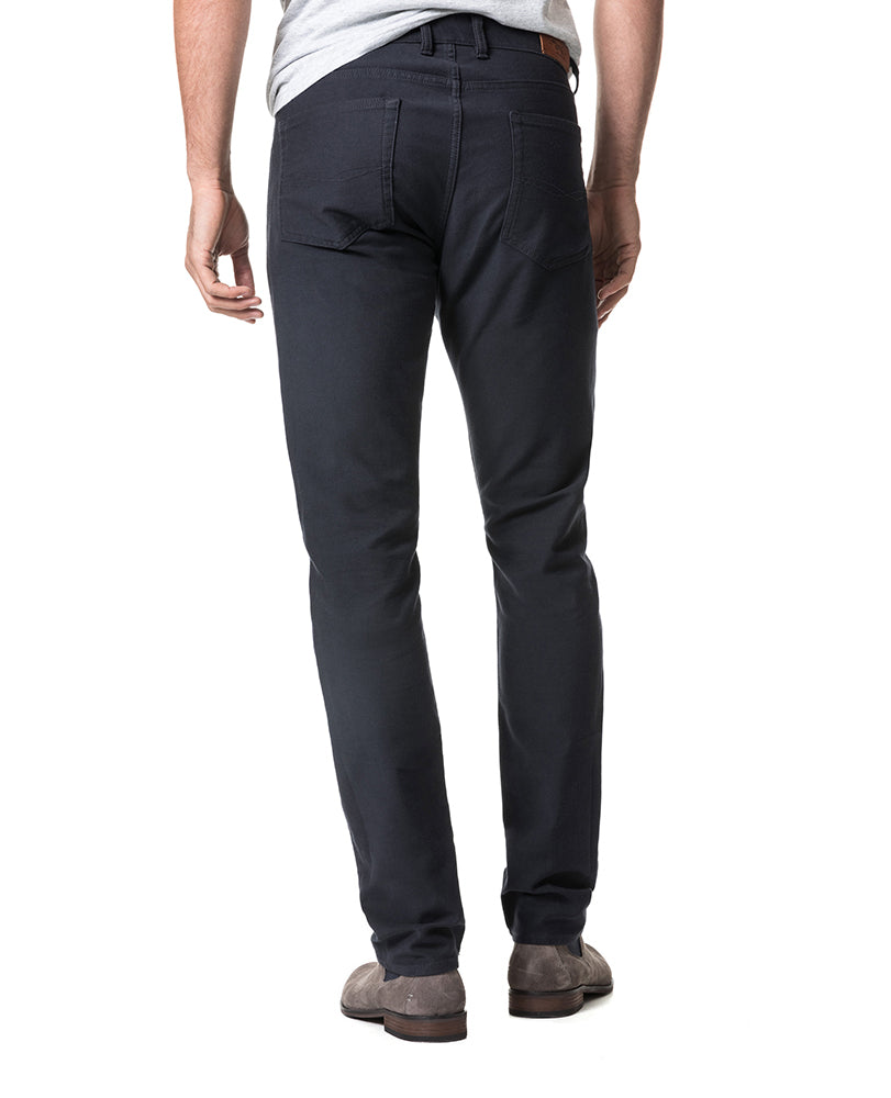 Model wearing Rodd & Gunn Motion 2 Straight Jean RL Navy.