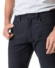 Load image into Gallery viewer, Model wearing Rodd &amp; Gunn Motion 2 Straight Jean RL Navy.
